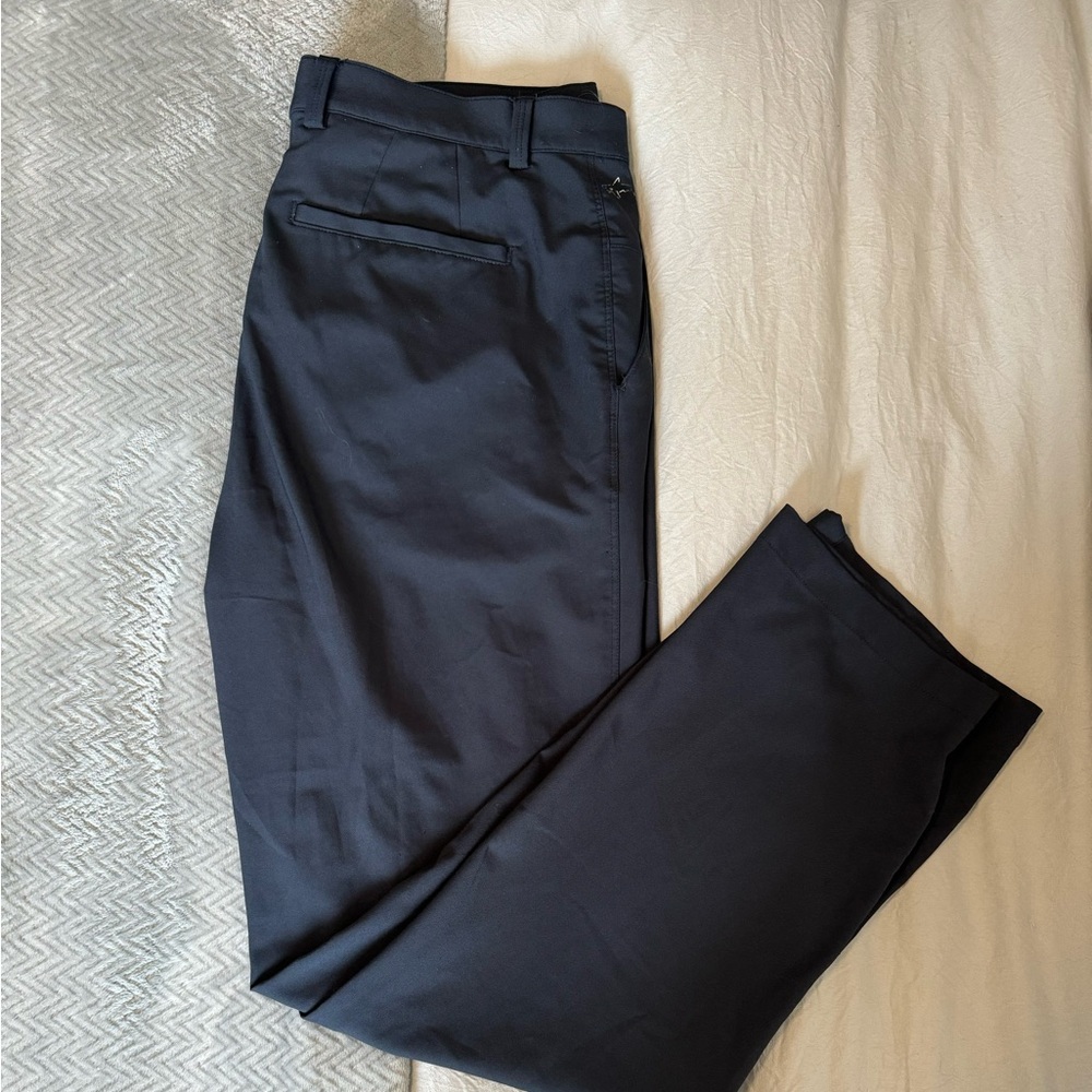 Greg Norman navy golf pant, size 33x30